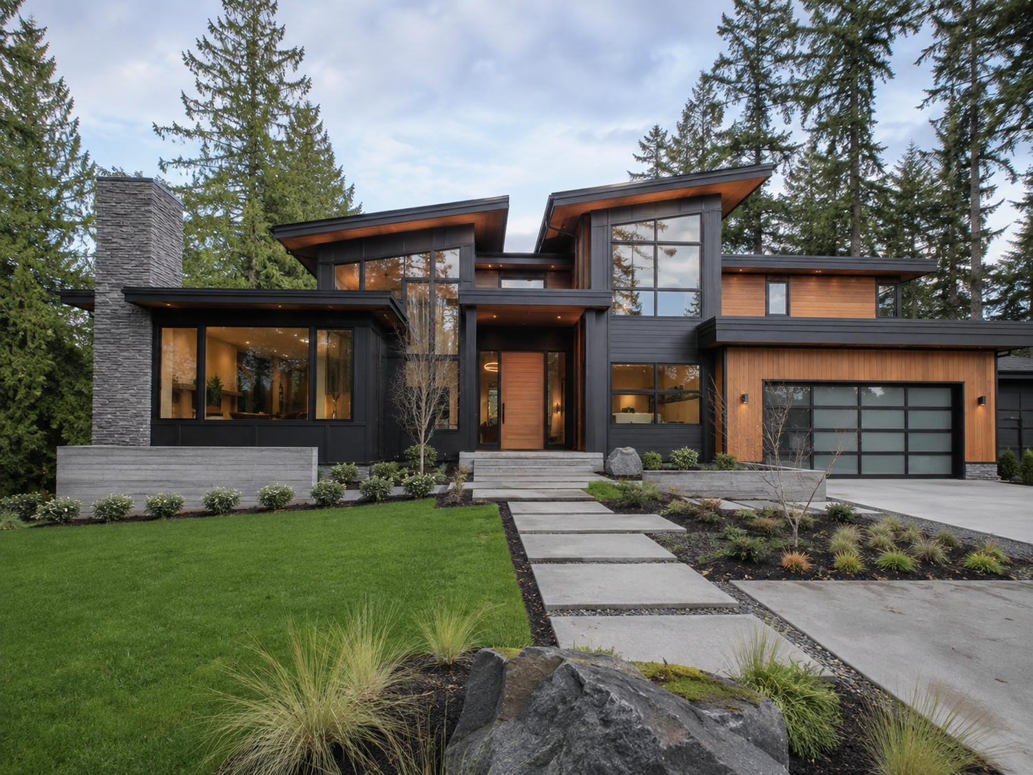 Finished luxury custom home with a modern facade in the BC Lower Mainland