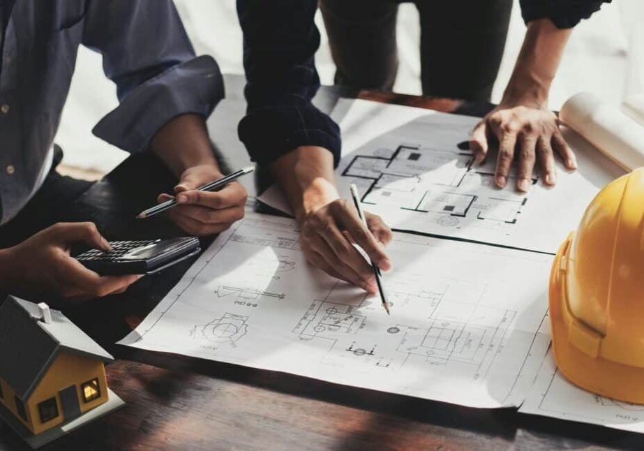 home builder and architect discussing plans